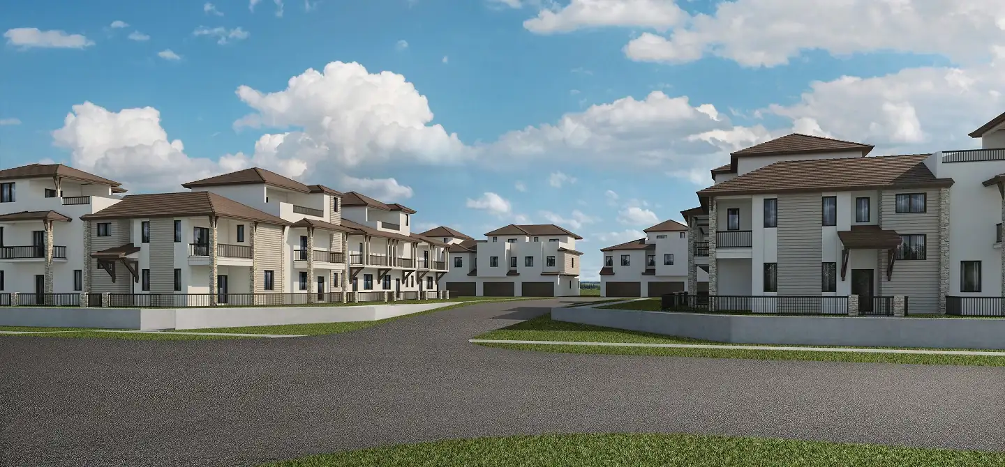 Altessa at Wilton Manors — calle interna de la comunidad con varios bloques de townhouses alrededor