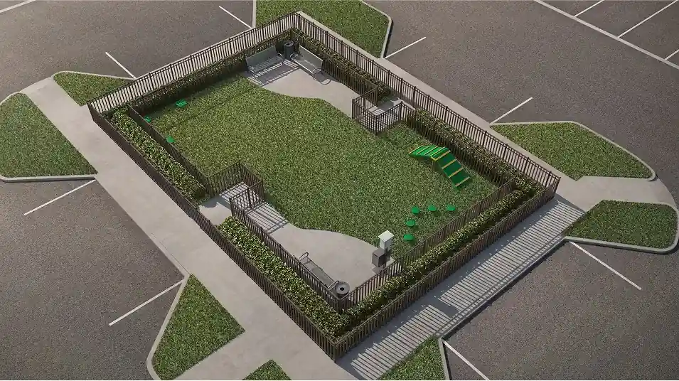 Altessa at Wilton Manors — vista aérea del parque para mascotas cercado, con obstáculos y bancas