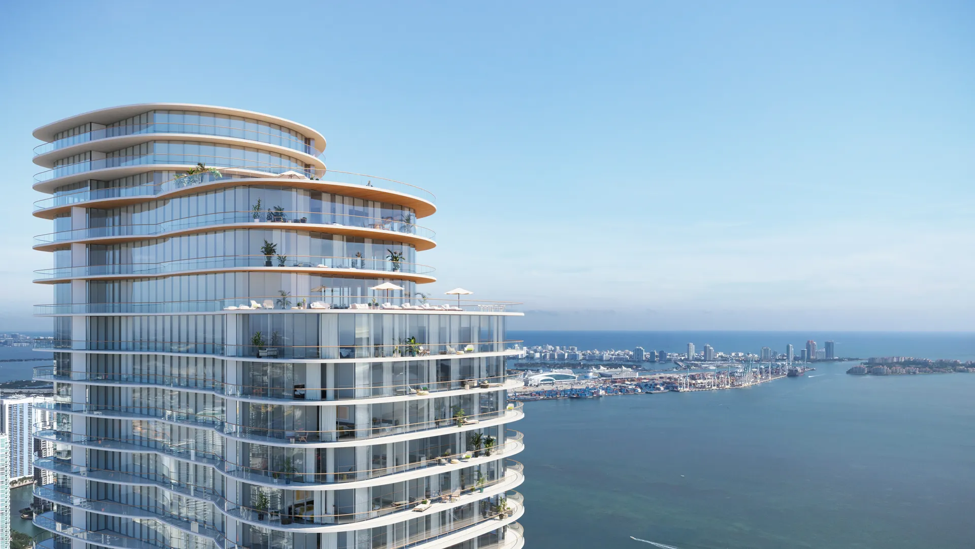Cipriani Residences Miami — la torre completa al atardecer, vista desde la bahía