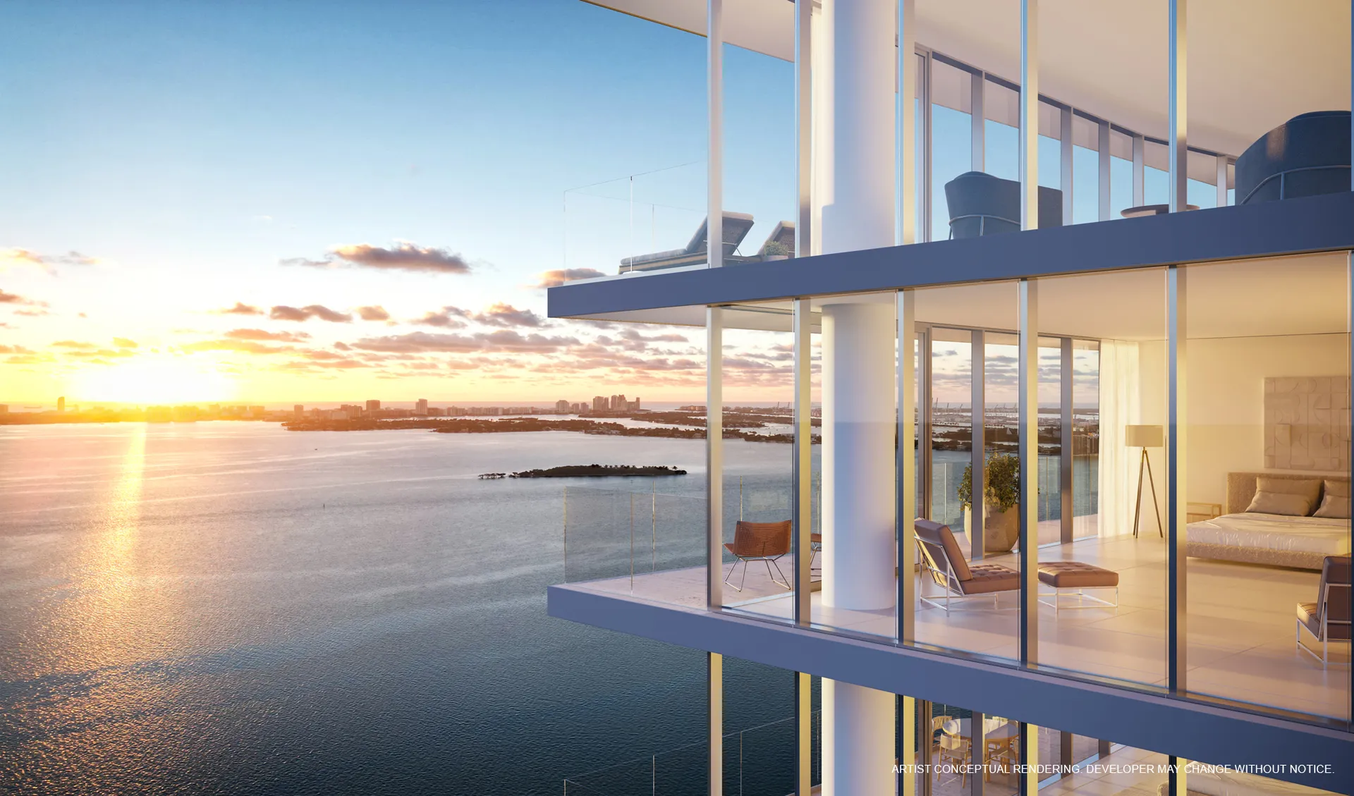Cove Miami — sala y comedor de una residencia con ventanas piso a techo frente a la bahía