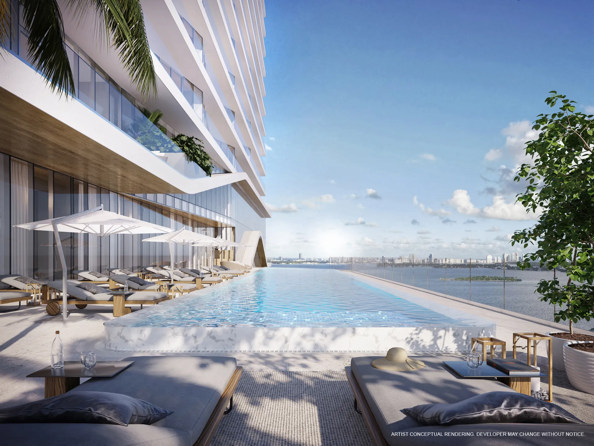 Cove Miami — piscina infinita y deck social con vista a Biscayne Bay