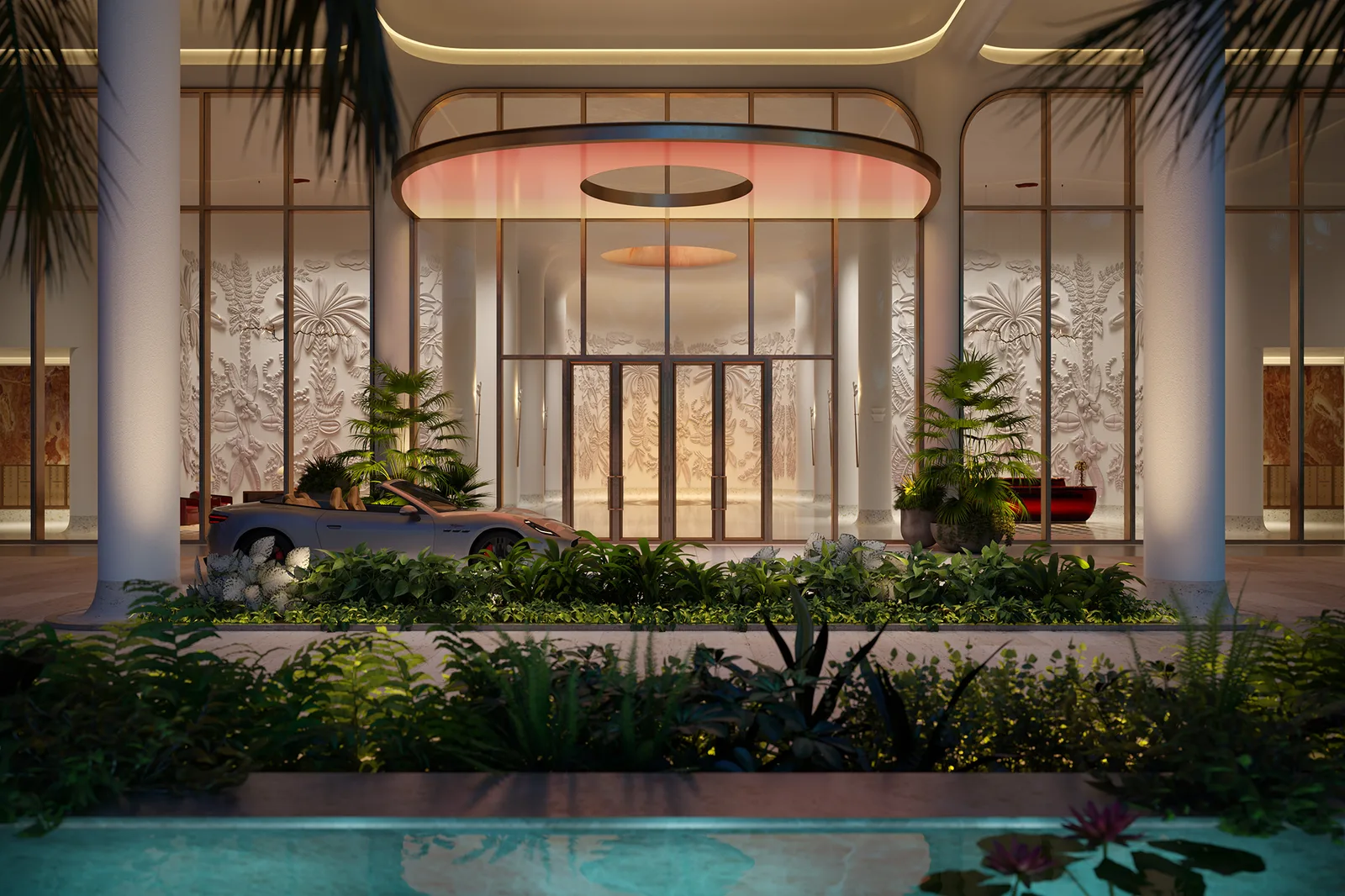 Arribo nocturno de Faena Residences Miami: auto de valet parking bajo un óculo iluminado, muros con relieve de helechos y un espejo de agua con flores de loto