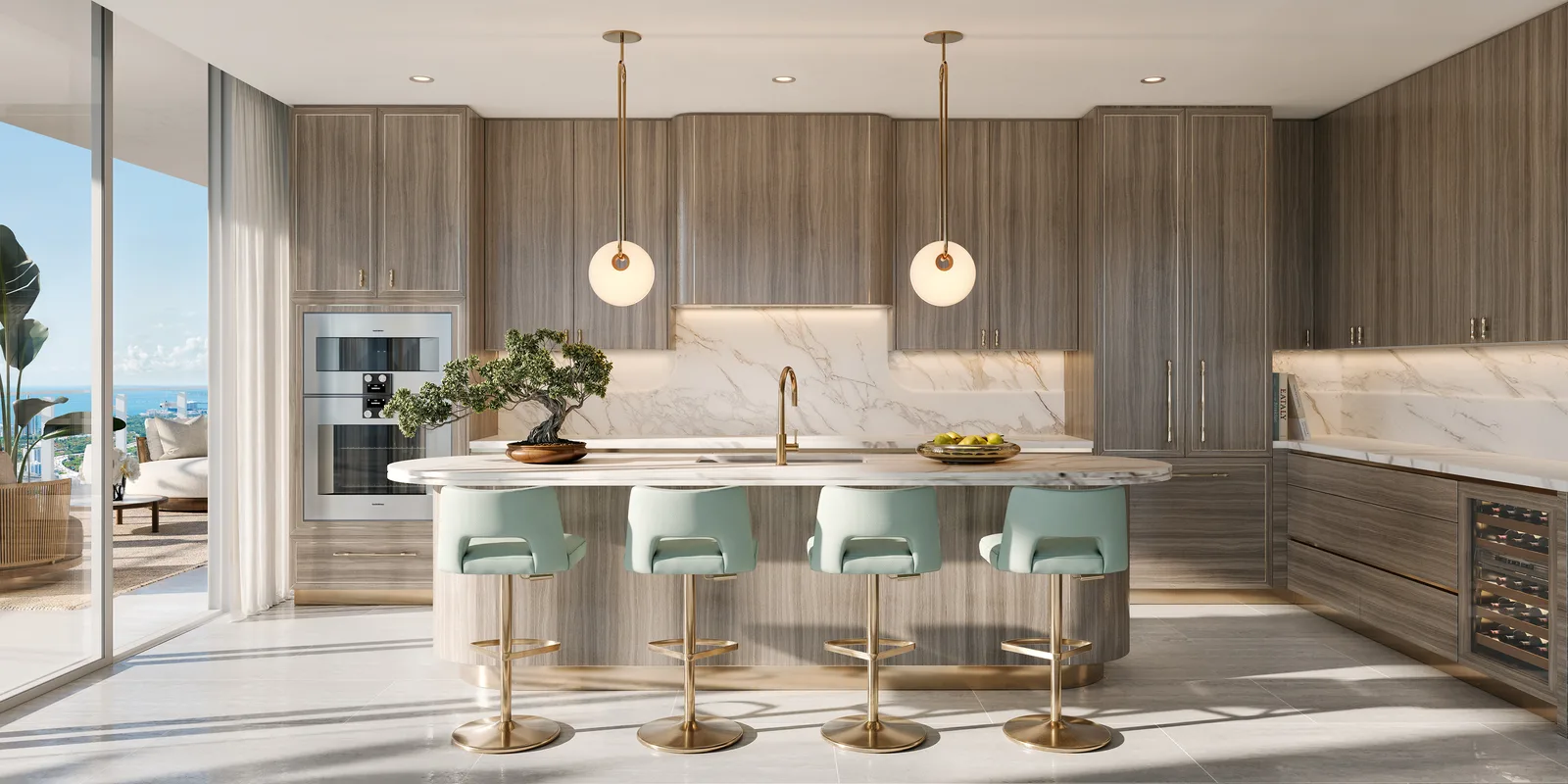 Cocina de una residencia con gabinetes en tono madera, cubierta de mármol veteado y banquetas color verde menta