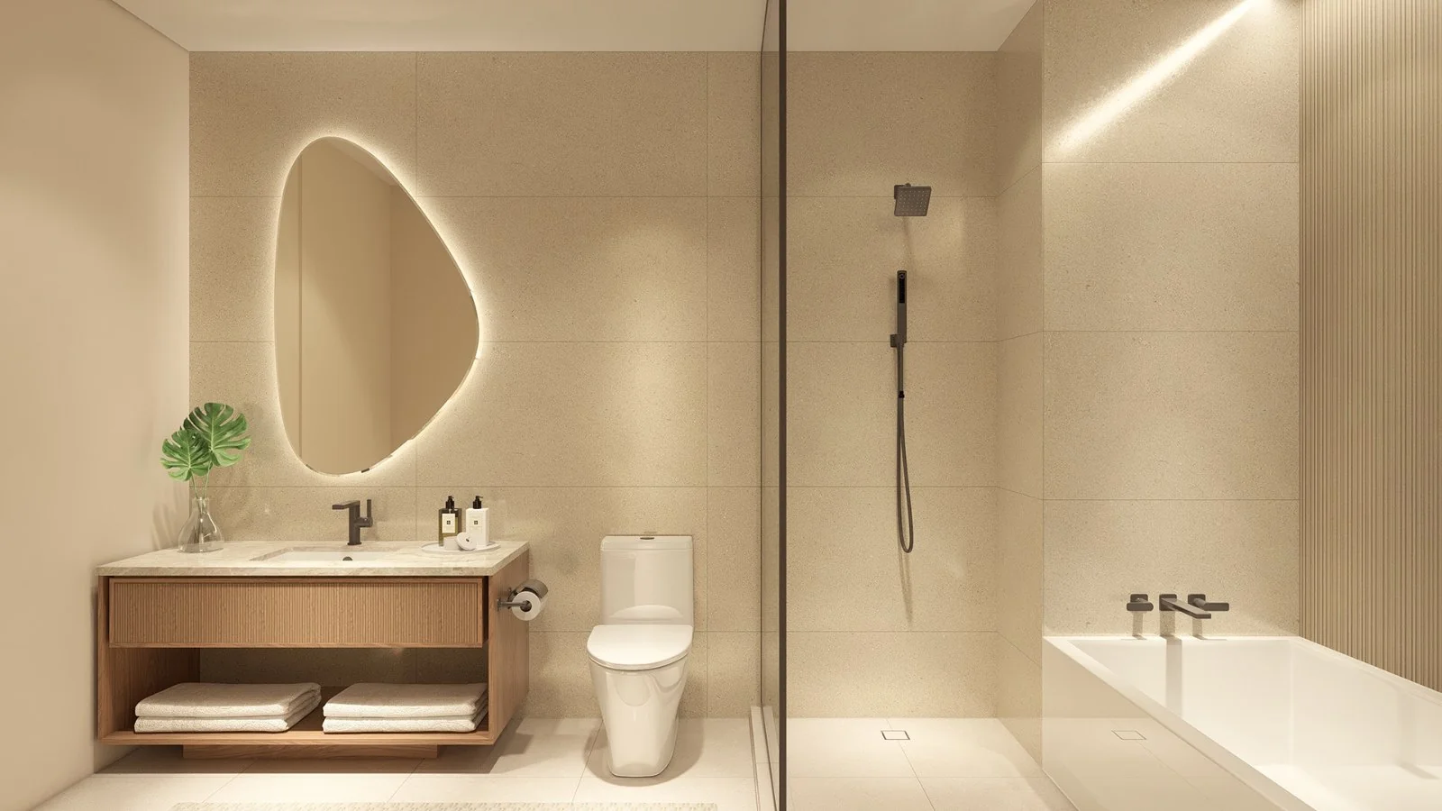 Gaia Residences Hollywood — baño principal con espejo de silueta orgánica y ducha de vidrio