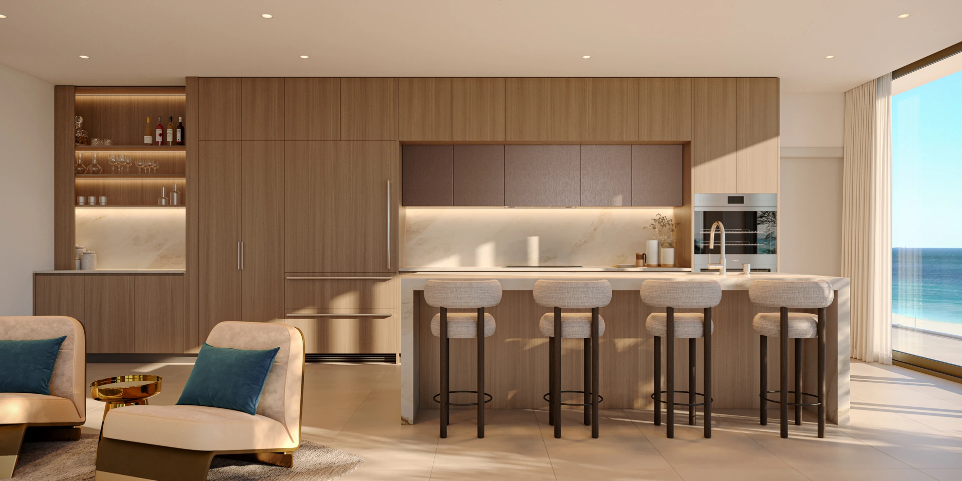 Hollywood Moon — cocina con gabinetes de roble europeo, isla con desayunador de seis banquetas y vista al mar por el ventanal lateral