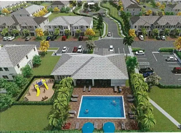 Merrick Square — vista aérea del clubhouse, la piscina y el área de juegos infantiles de la comunidad
