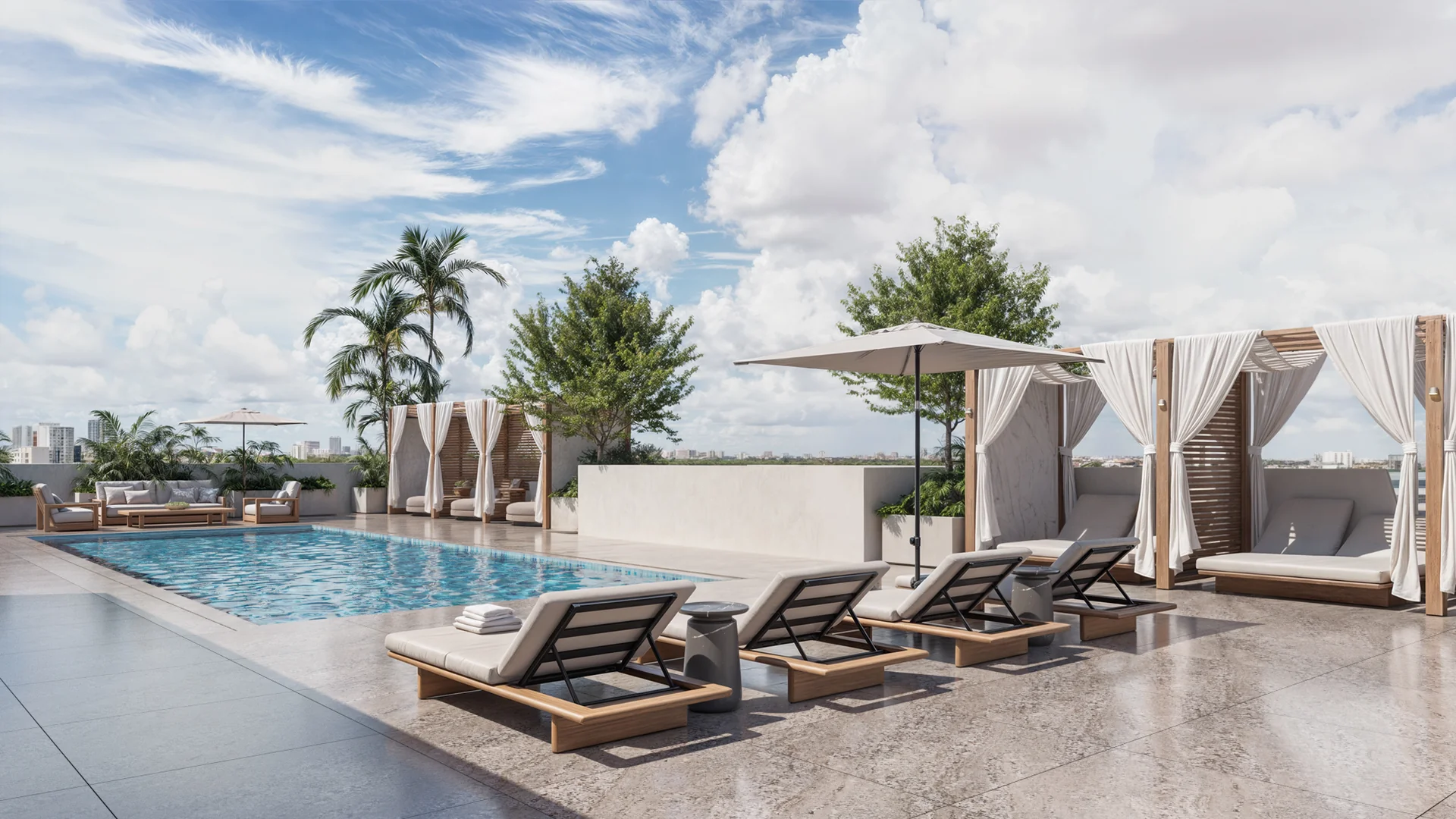 Millux Place — piscina en la azotea con camastros, cabanas y vista a Brickell