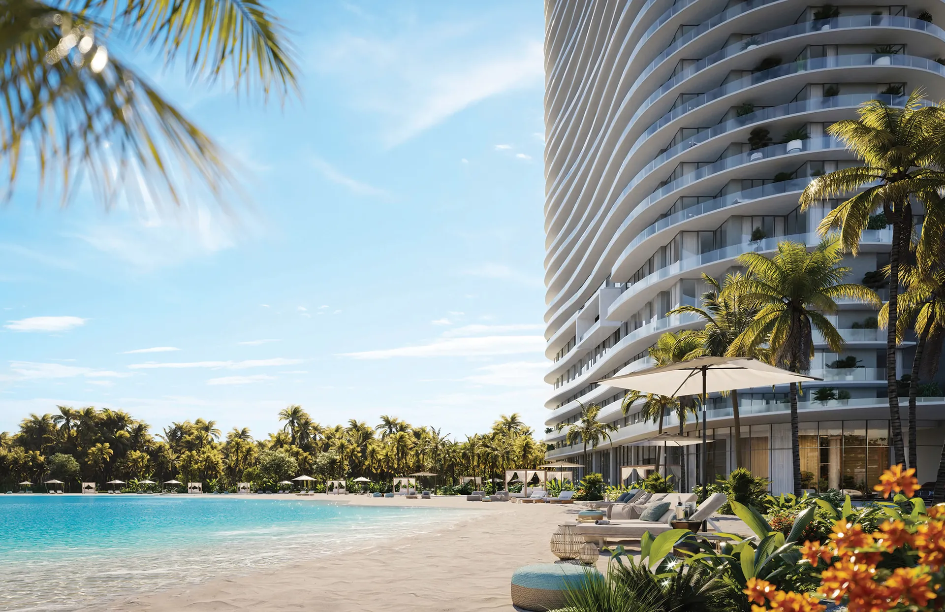 One Park Tower — la torre desde la playa de arena de la laguna cristalina