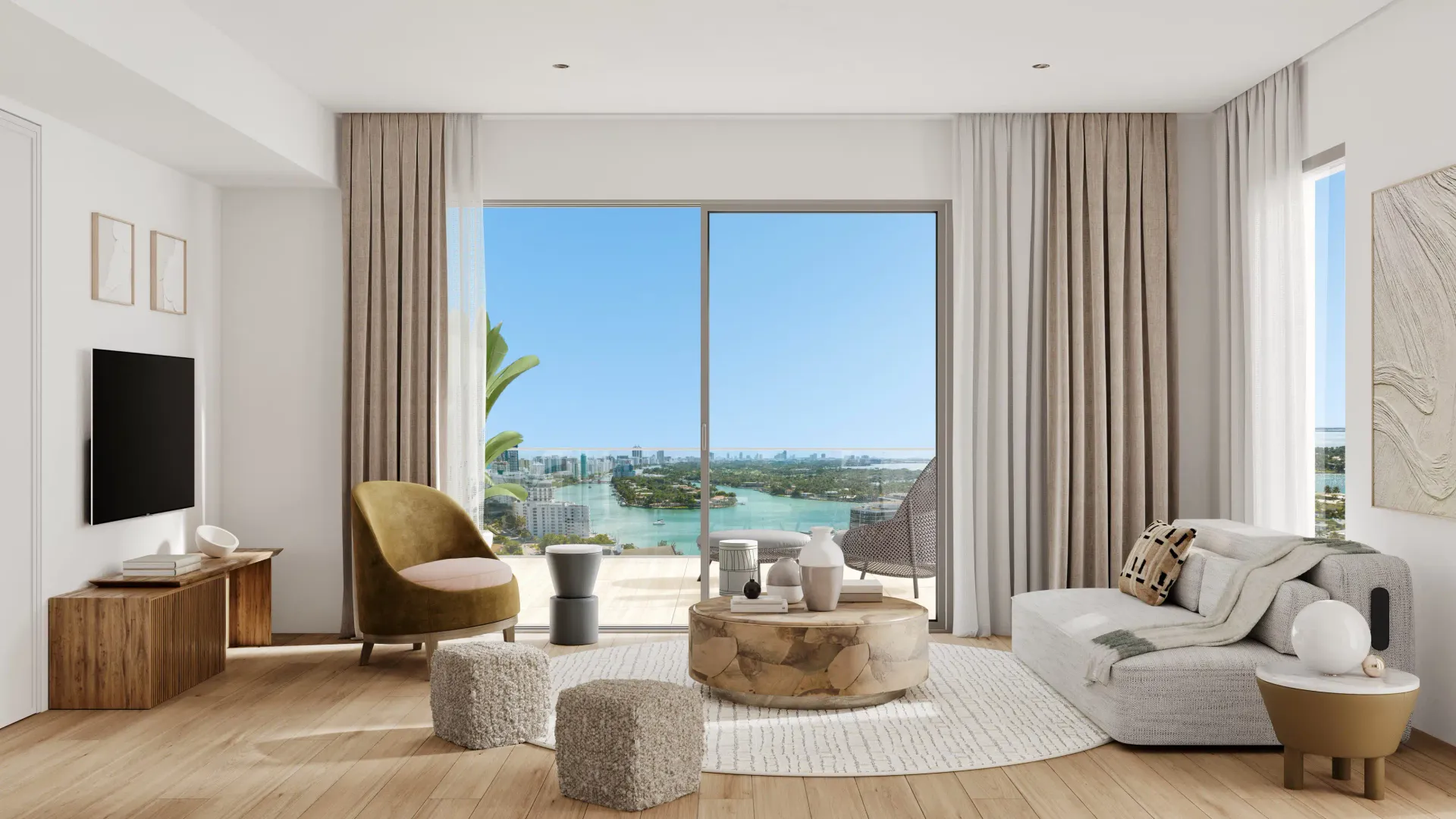 Palma Miami Beach Residences — sala de estar con vista al agua y acabados en tonos cálidos