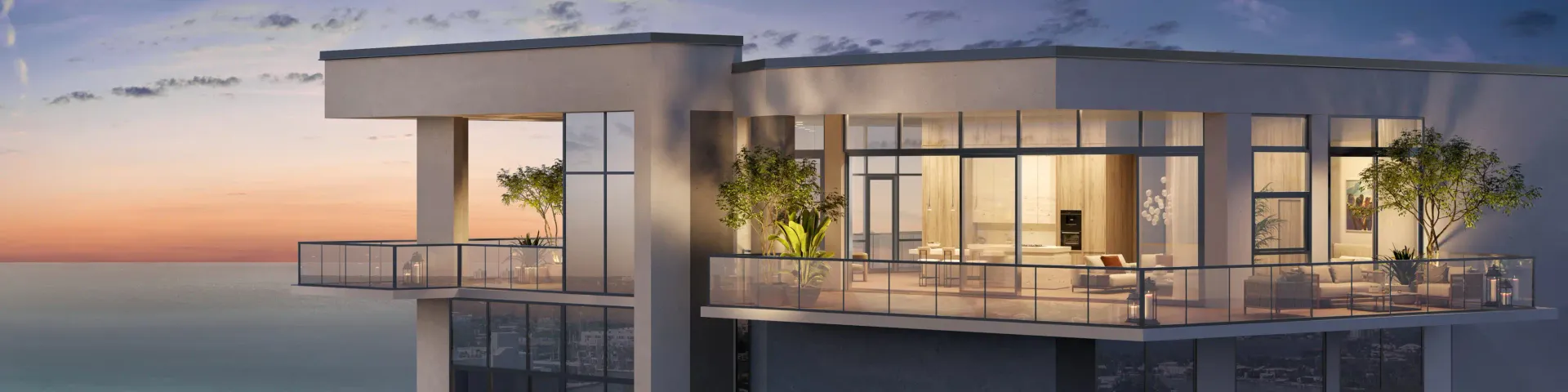 Palma Miami Beach Residences — vista aérea del edificio al atardecer, junto a residencias frente al agua