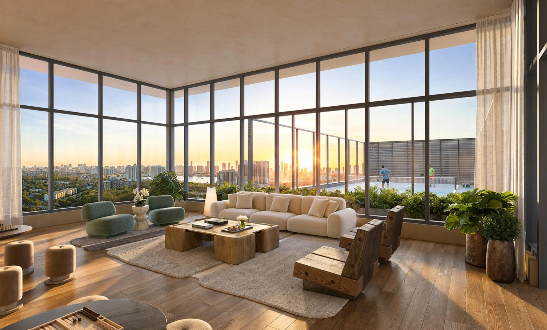 The William — sala de planta abierta con ventanales corridos y vista a la piscina y al atardecer