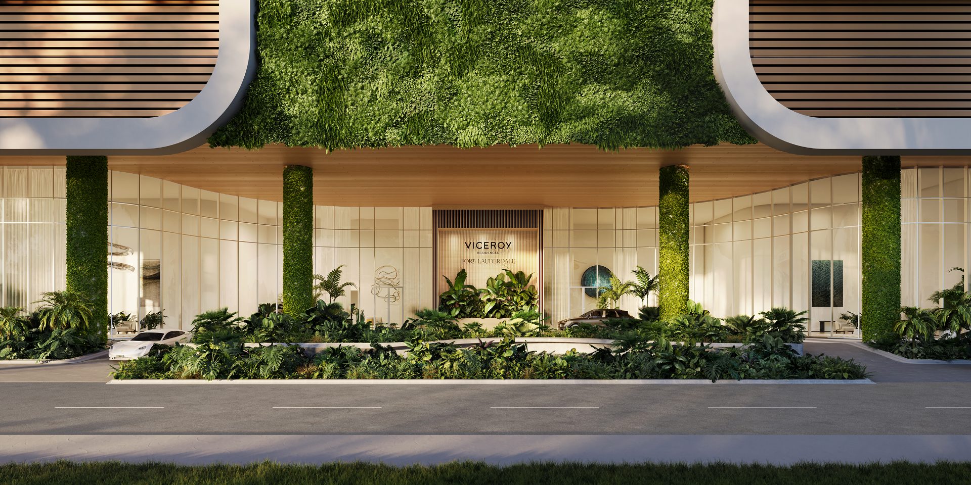 Viceroy Brickell — entrada principal (porte cochère) con muros verdes y el letrero de la marca