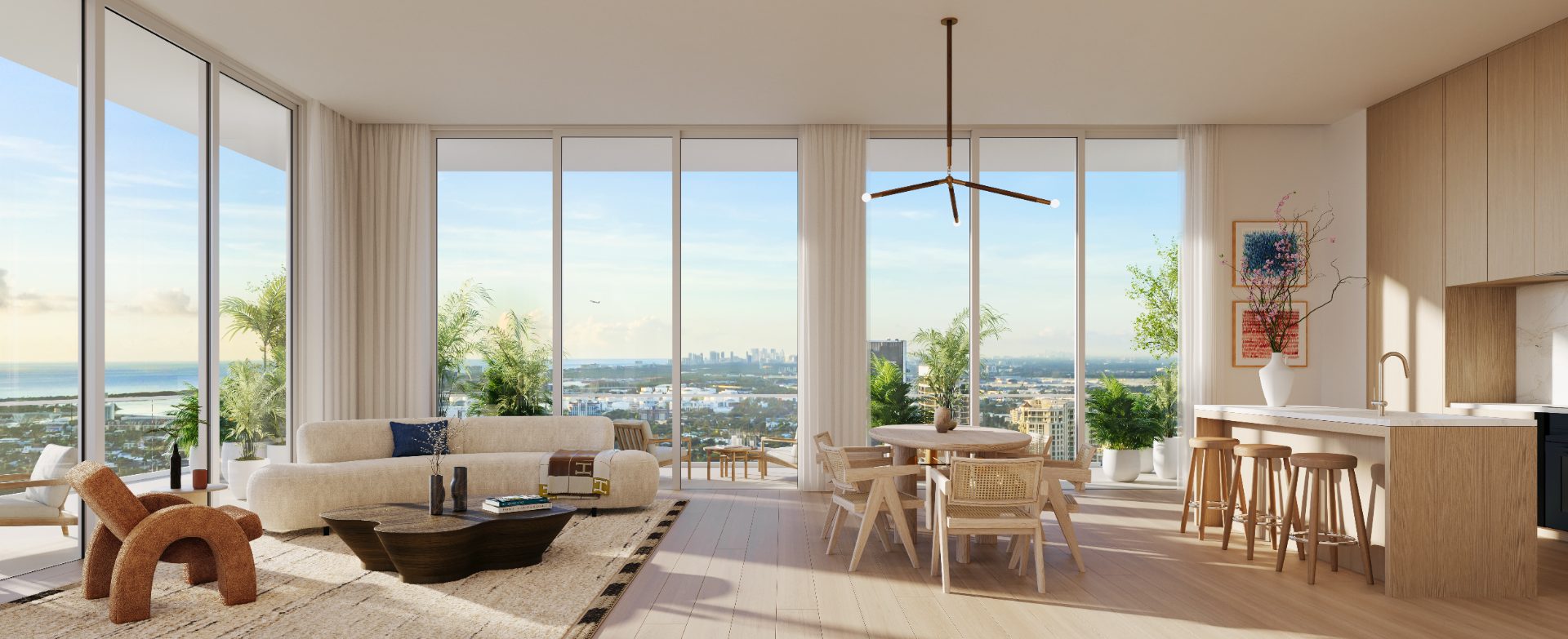 Viceroy Brickell — sala, comedor y cocina de una residencia con vista al horizonte de Miami