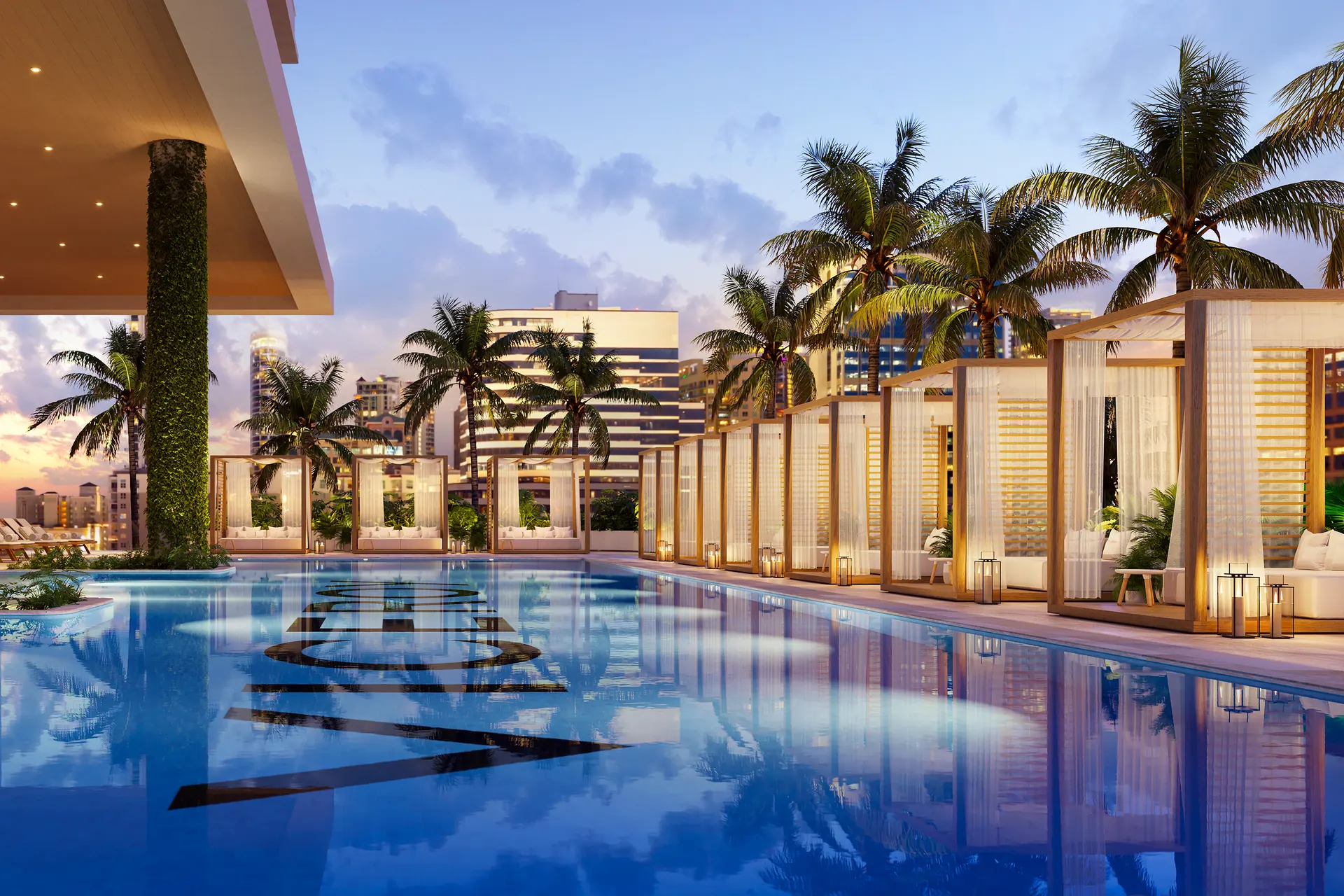 Viceroy Ft. Lauderdale — piscina estilo resort al atardecer, con cabañas privadas, palmeras y el logotipo de la marca en el fondo del agua