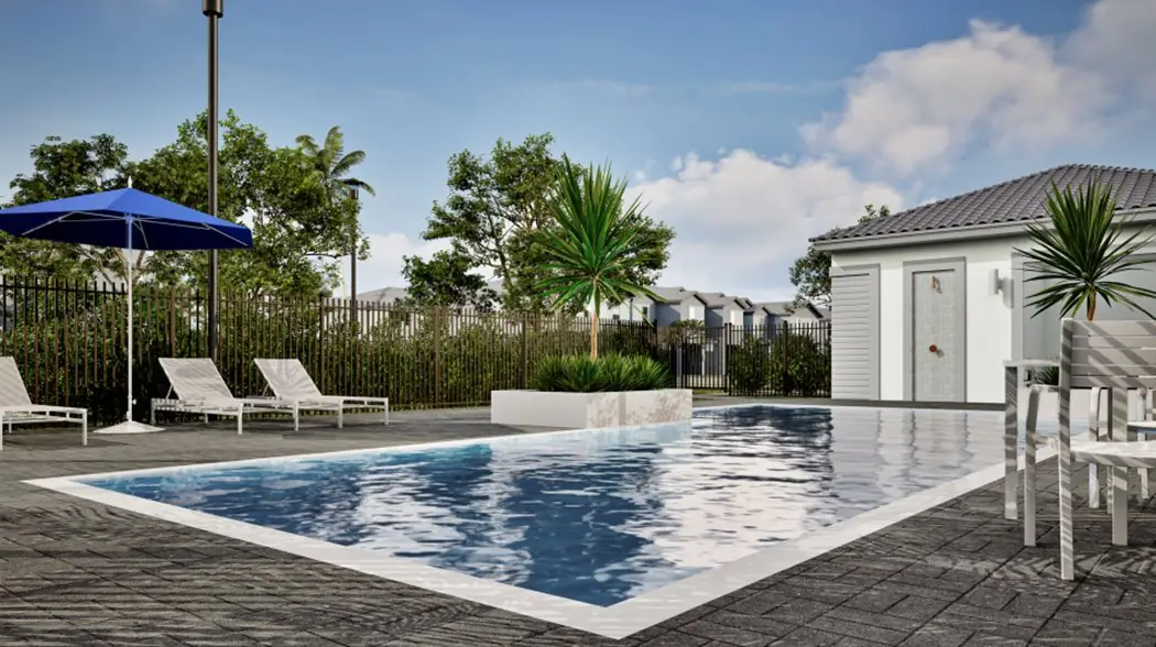 Vivant — piscina comunitaria con camastros, sombrilla y cabana al fondo